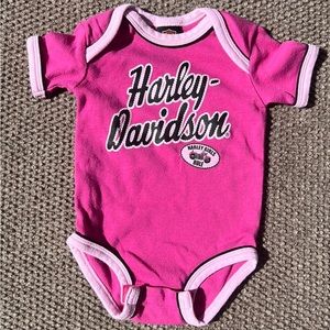 Harley Davidson onesie, size 6/9 months. NWOT. “Harley Girls Rule”